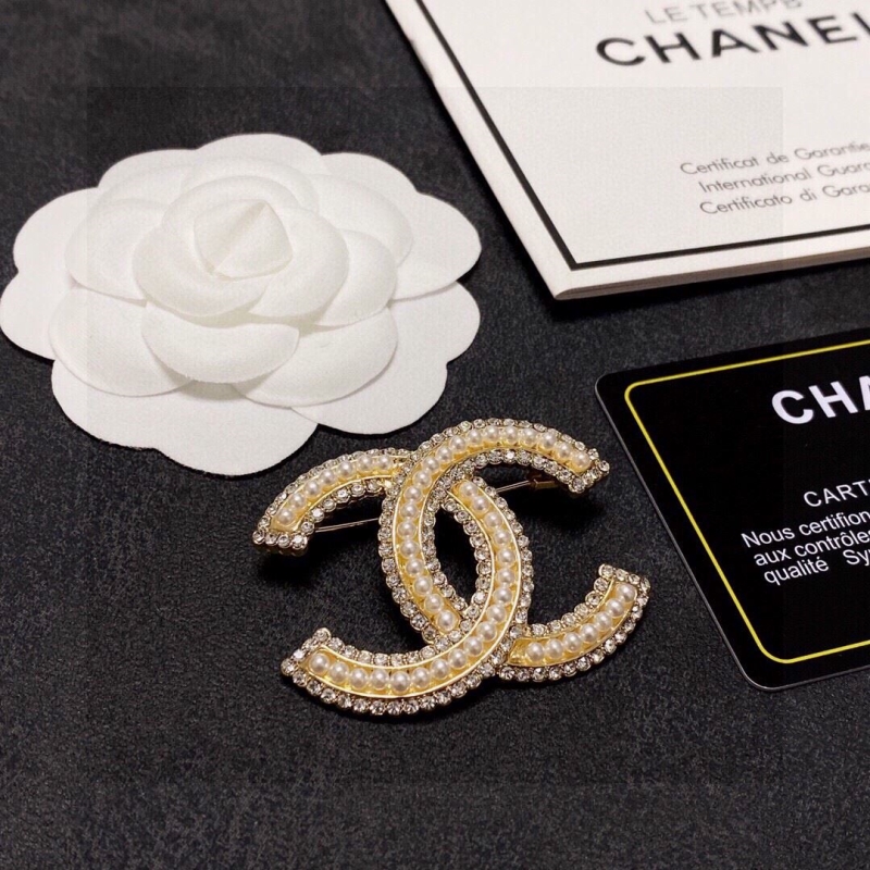 Ch*el brooches